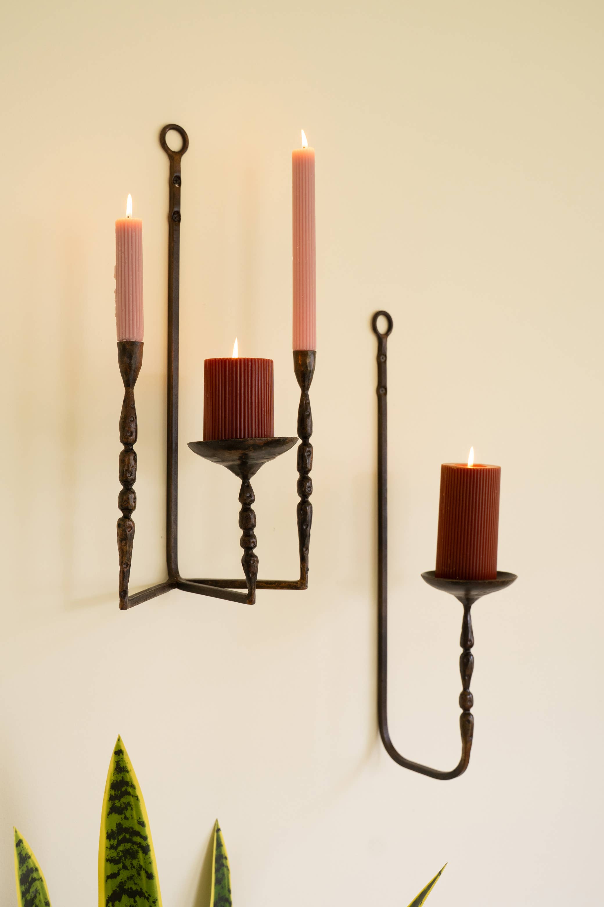 Brown FORGED IRON WALL TAPER AND PILLAR CANDLE HOLDER for wholesale on Faire3