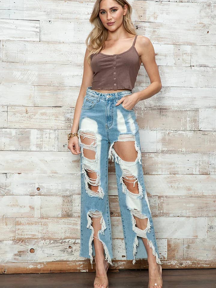 Délavage denim bleu clair Jean large taille haute délavé avec effet usé prononcé en vente sur Faire1