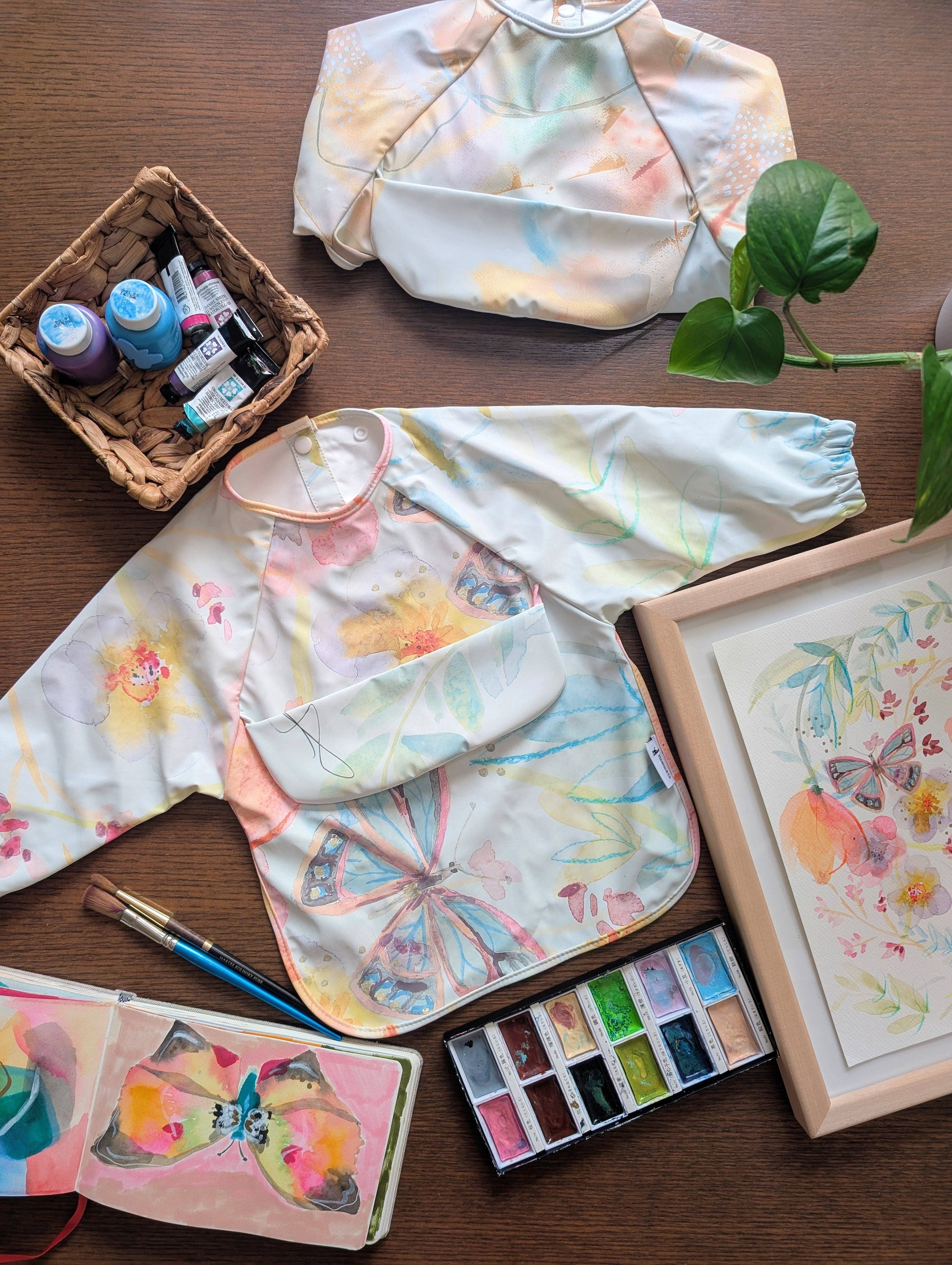 Micasso & Co - Wholesale Apron - Kids - Long-sleeve bib with integrated pocket1