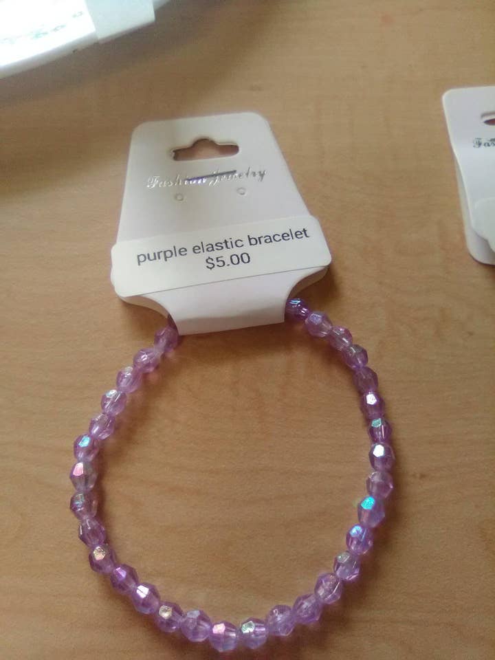 Elastic purple beaded bracelet. for wholesale by Lynn's handmade jewelry