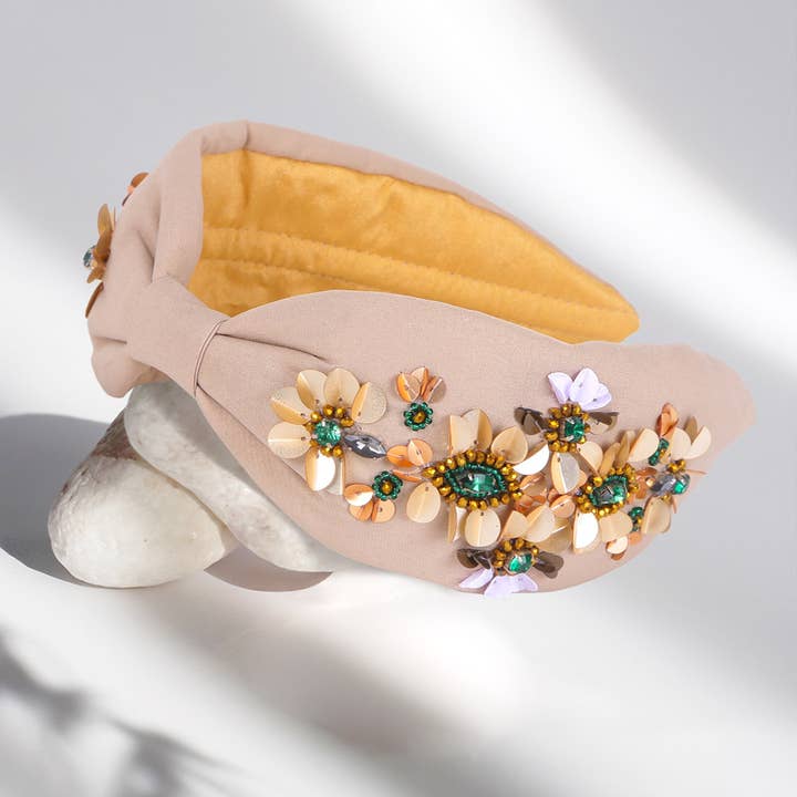 Cerchietto decorato con paillettes floreali per la vendita all'ingrosso da parte di Sensibling Corp.