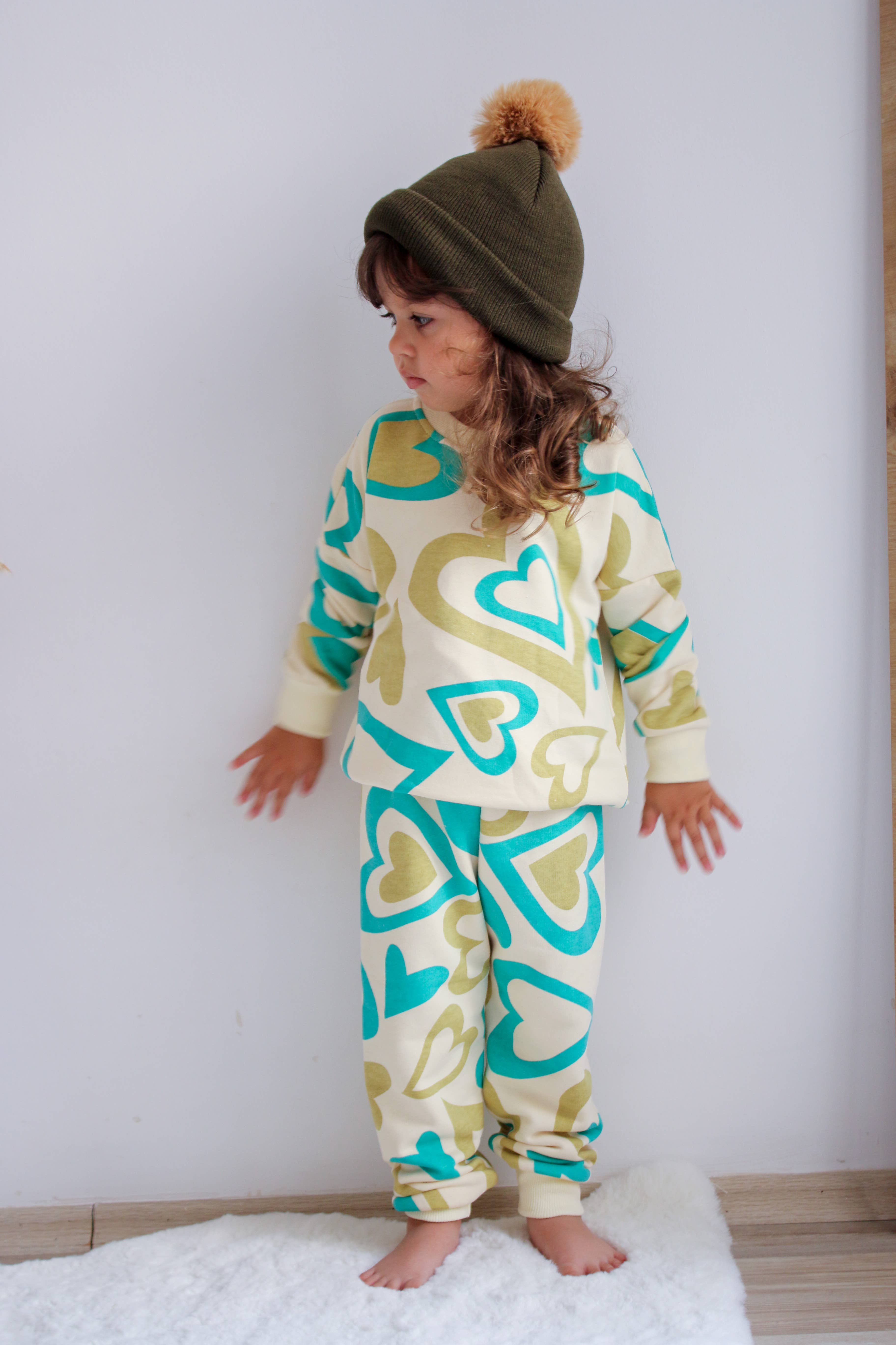 Camel Single Pom Pom Baby/Kid's Green Beanie Hat, 0 to 8 Years for wholesale on Faire1