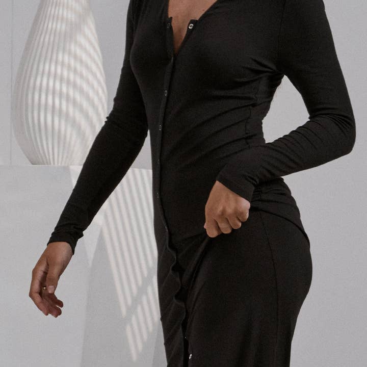 Immersed Black Soft Modal Rib Snap Front Long Sleeve Dress for wholesale on Faire