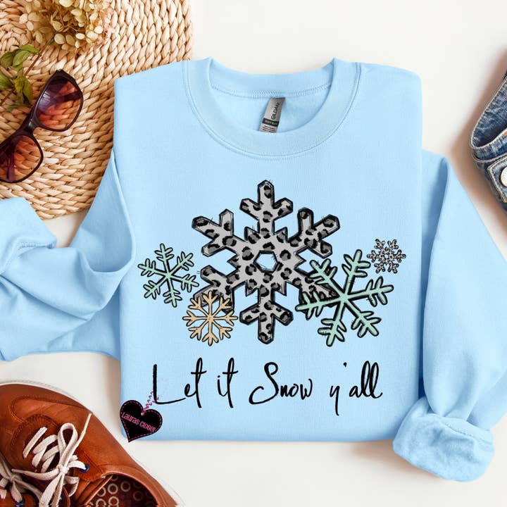 Lad det sne - Grafisk T-shirt for engroshandel hos Lauras Closet