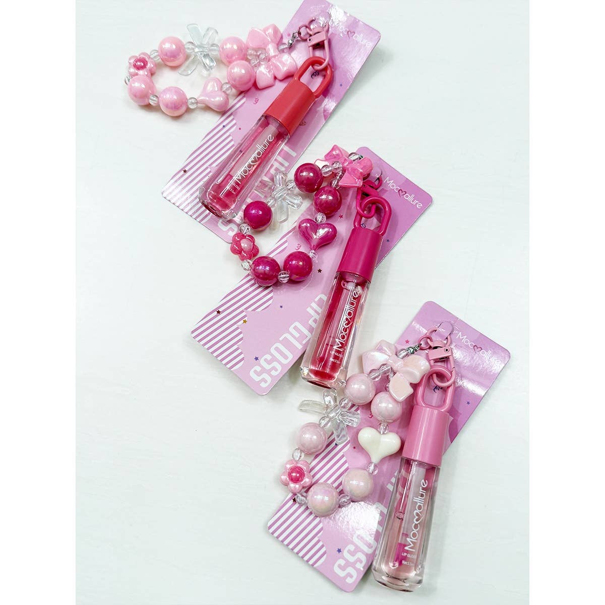 ROSE MULTI Porte-clés Charme Nœud Mignon avec Ensemble de Gloss à Lèvres Parfumé en vente sur Faire2