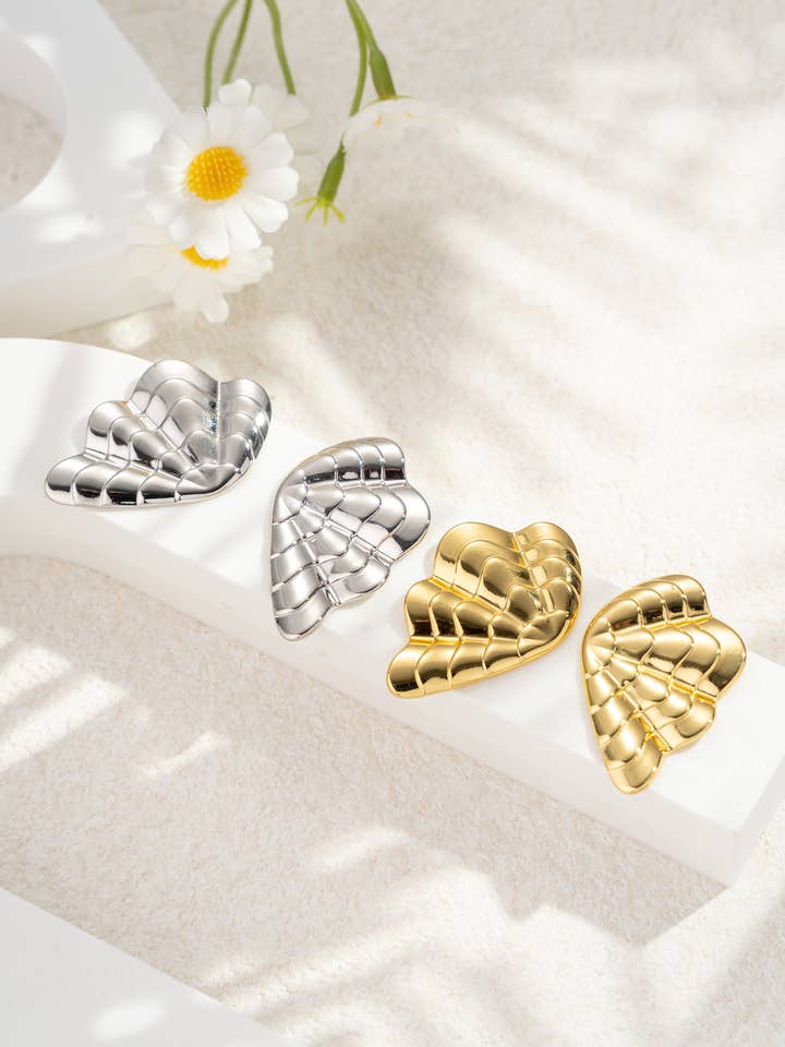 Boucles d’Oreilles Femme Ailes Stylisées en Acier Inoxydable pour la vente par COSMOS