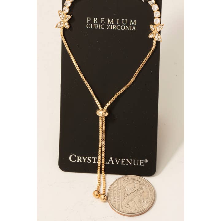 Fame Accessories - Vente Bracelet de perles - Bracelet en corde avec breloques papillon en oxyde de zirconium cubique2