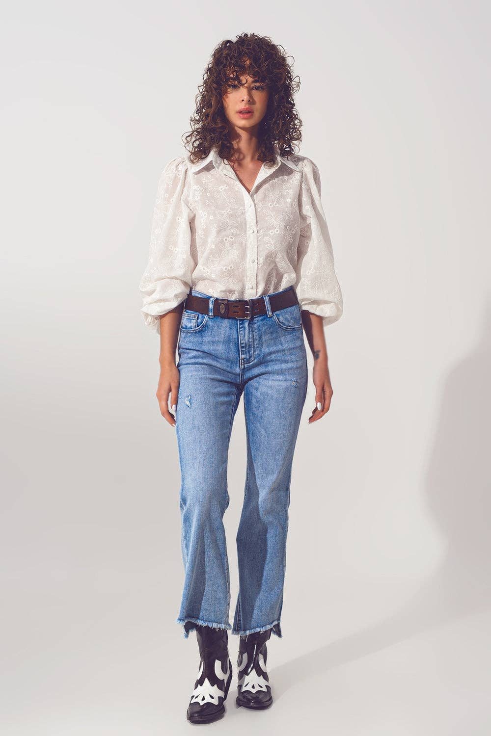 Flared Jeans in Light Blue with Asymmetric Hem for wholesale on Faire2