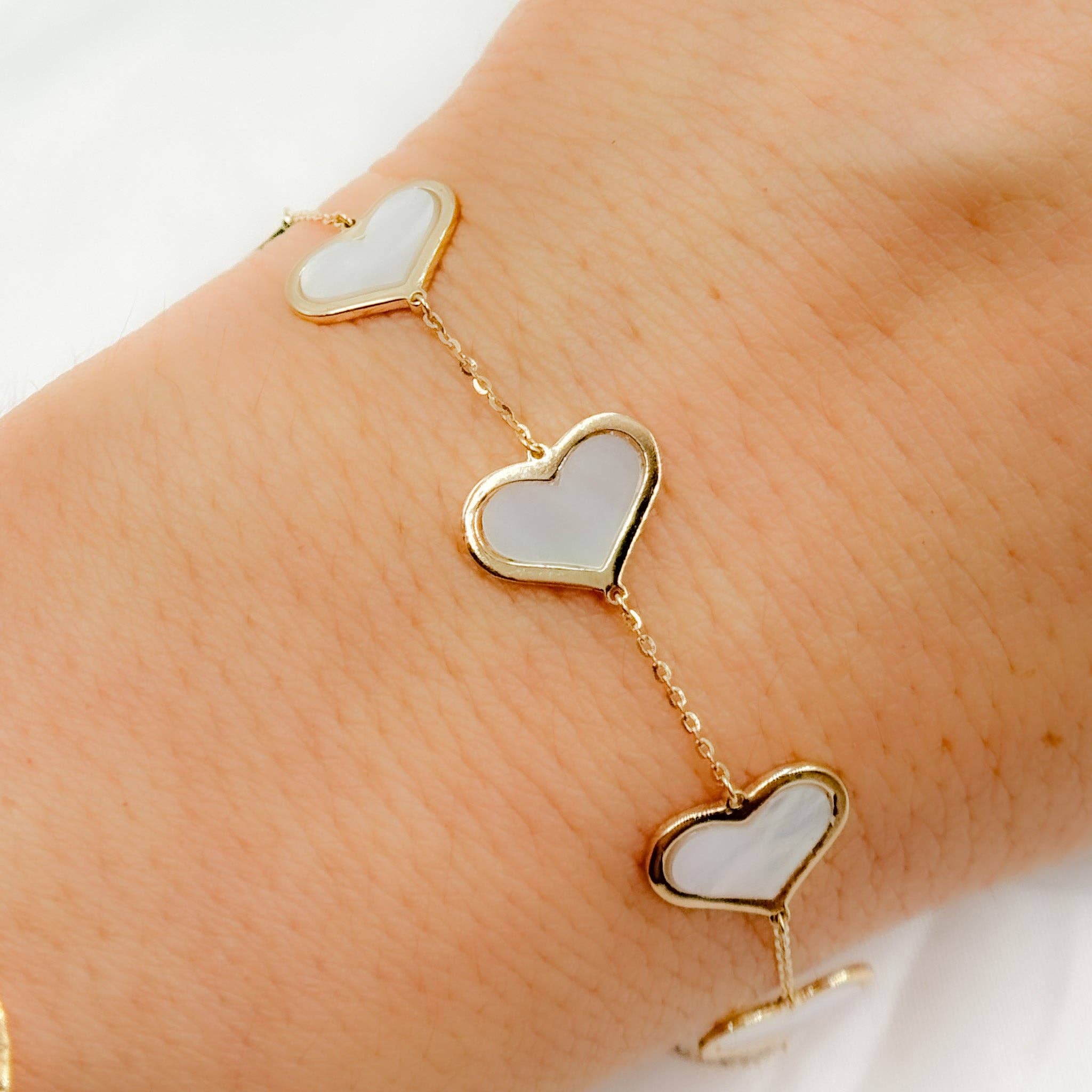 Yellow BR402583. 14K Solid Gold Mother of Pearl Heart Bracelet for wholesale on Faire1