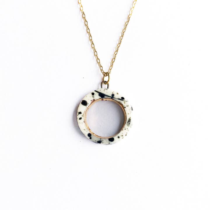 Open Circle Necklace - Black Splatter + Gold for wholesale by StitchPrism