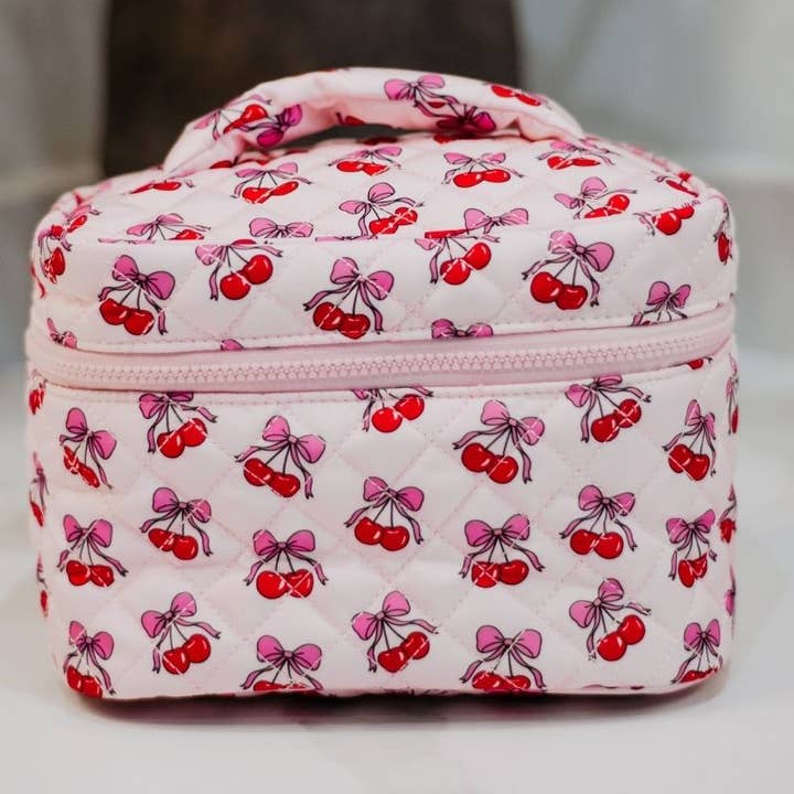 Trousse de maquillage de voyage à motifs de nœuds de cerise pour la vente par Katydid