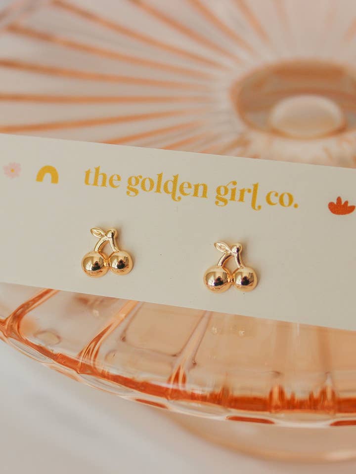 Clous de cerise dorée pour la vente par The Golden Girl Co.