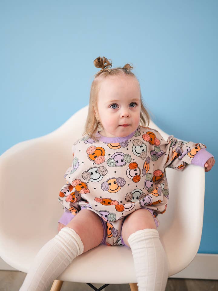 Oversized Cozy Romper - Fuzzy Smiley for wholesale by Addie Joy company