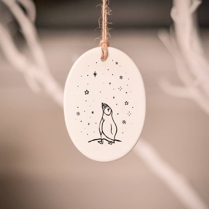 Stargazing Puffin Ceramic Tree Decoration for wholesale by frog and gnome