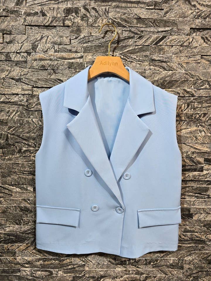 Sleeveless buttoned vest, two faux pockets UL23088 Bl for wholesale by Adilynn DAYMENTEX