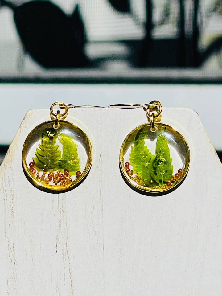 Dried/pressed ferns preserved in resin gold earrings for wholesale by Handmade clay and resin Jewelry