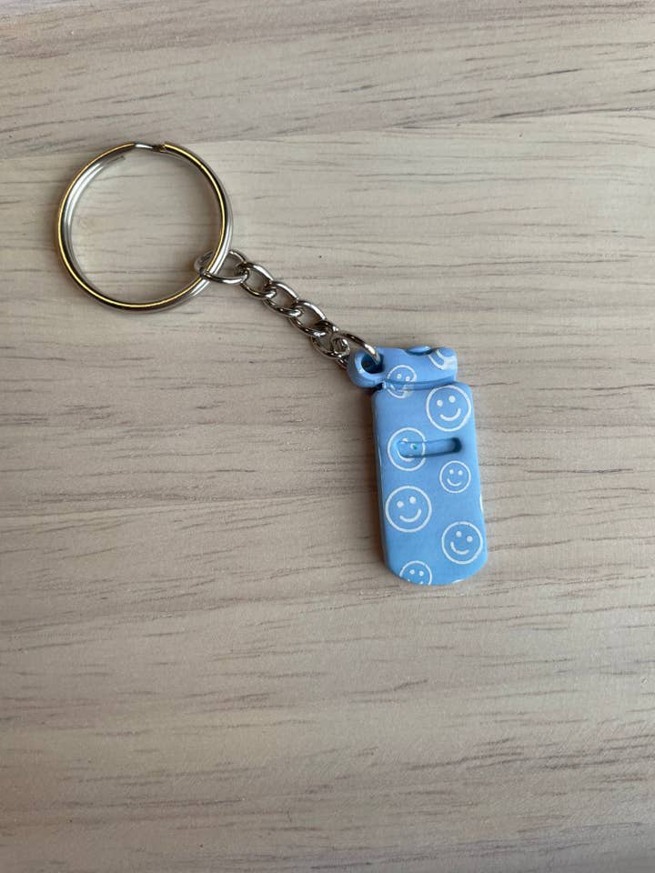 Emotional support water bottle keychain-blue for wholesale by Cozy Clay LLC