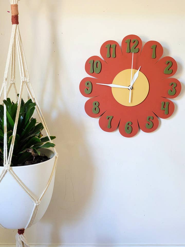 Reloj de pared con forma de margarita naranja quemada para venta al por mayor de Shelfish Modern