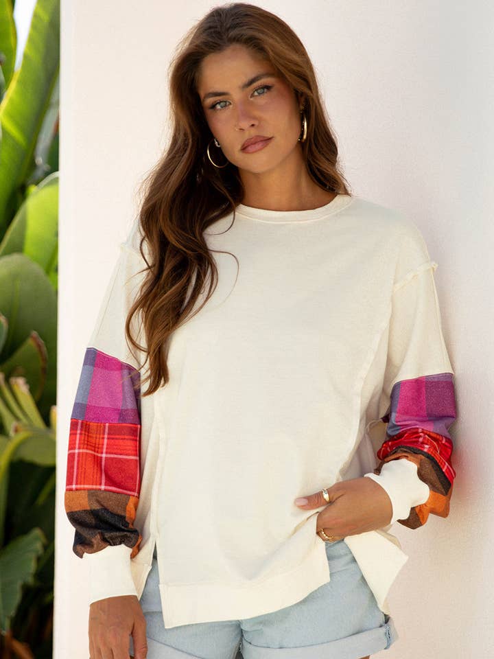 Top a maniche lunghe con cuciture esposte e motivo patchwork a quadri per la vendita all'ingrosso da parte di PRETTY BASH