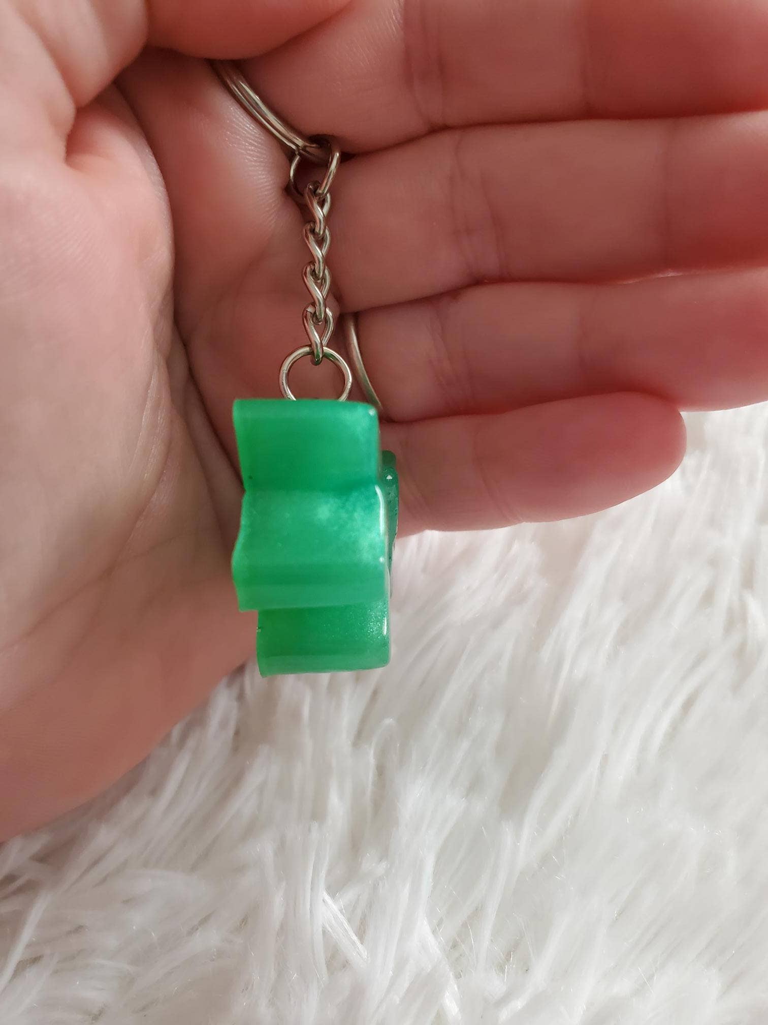 Tots And Tumblers Art - Venta al por mayor Llavero - Niños - Llavero de resina de dinosaurio, llavero tipo mochila6