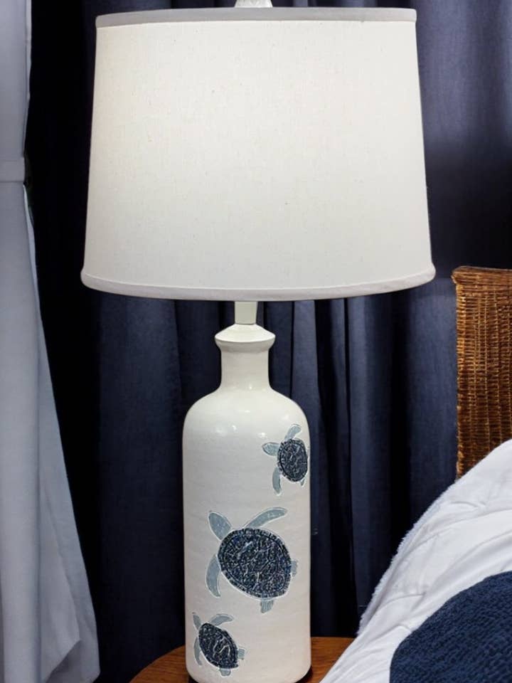 Weathered Nude Etched Turtle Table Lamp for wholesale by Coast Lamp Mfg