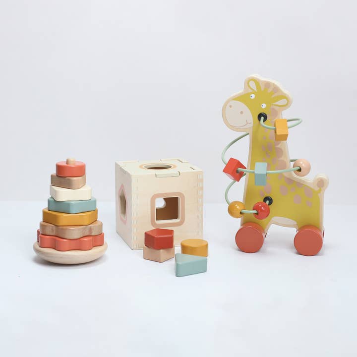 3 wooden activity games set for wholesale by Trois kilos Sept