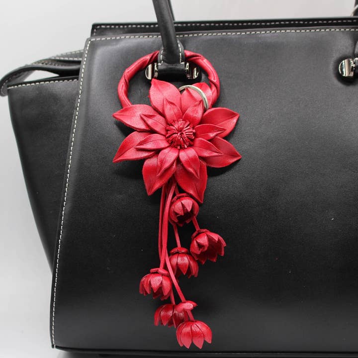 leather flower purse charm key chain poinsettia red or white for wholesale by Sunflower Handmade leather inc