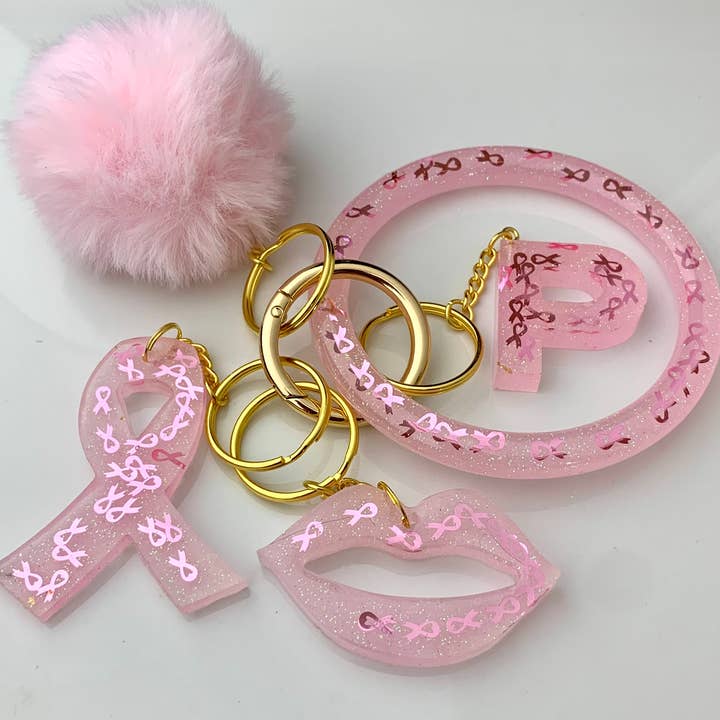 rosa Glitter Cancer Medvetenhet Nyckelring Set för wholesale av Shop Drip Express