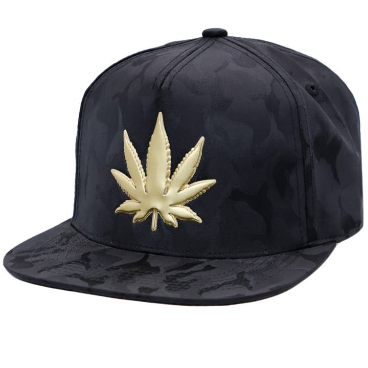 Cap Zone - Wholesale Flat Brim Cap - Men's - Gold Marijuana Leaf Embossed Camo Polyester Fabric Snapback