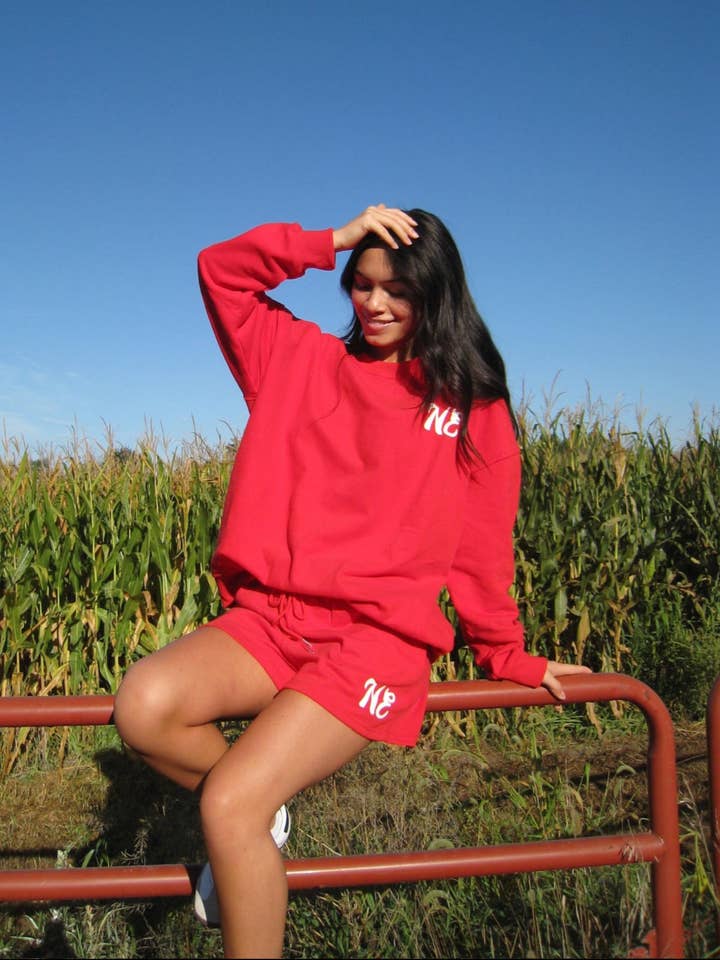 Red NE Good Life Core Sweatshirt for wholesale on Faire16