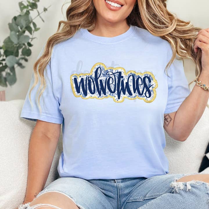 Wolverines Blue Floral Mascot Faux Glitter DTF Heat Transfer for wholesale by Trendy Transfers