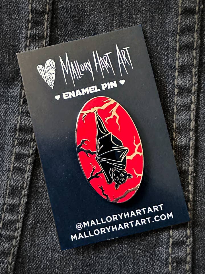 Hanging Bat Enamel Pin for wholesale by Mallory Hart Art