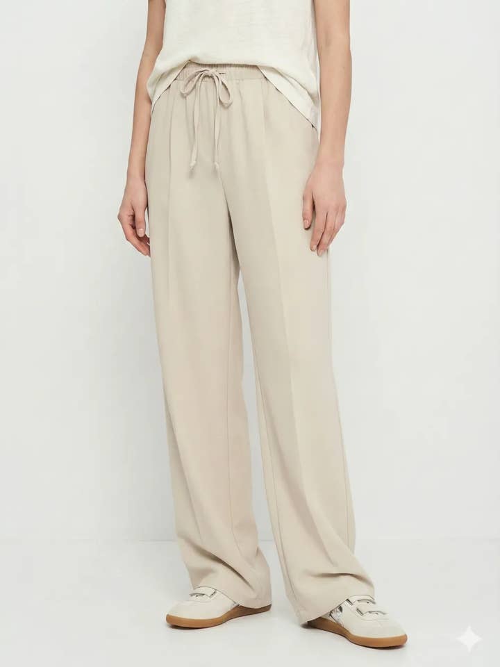 Calças Largas Fluidas com Pregas @71530_PaLNervure por atacado de Mimi & Gogo