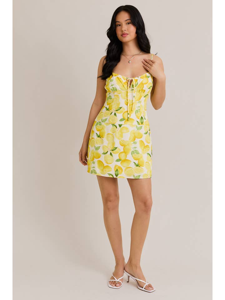 CREAM YELLOW SHIRRED NECK LOW WAIST DRESS for wholesale on Faire