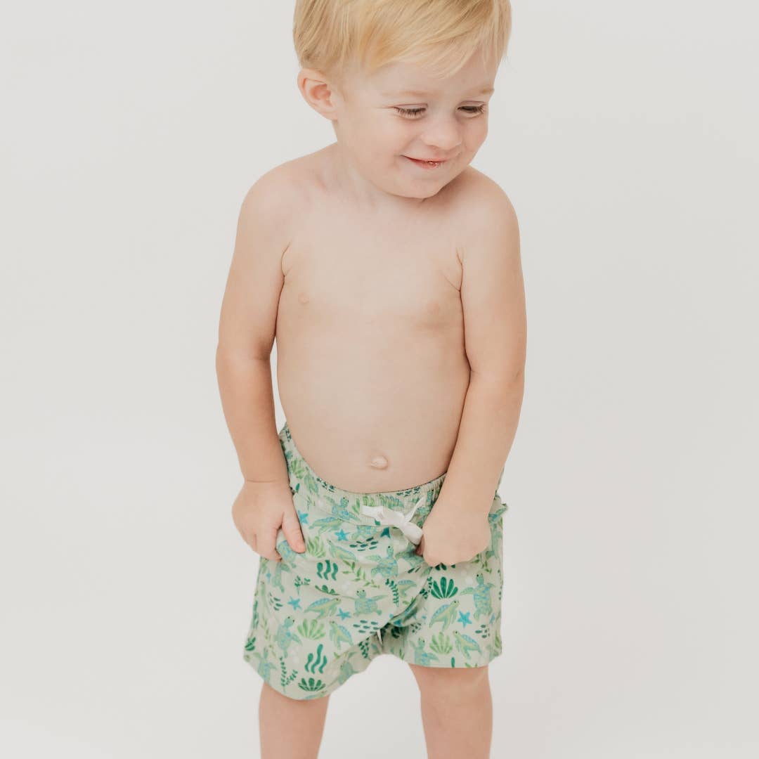 Green Save the Sea Turtles Boys Swim Trunks for wholesale on Faire4