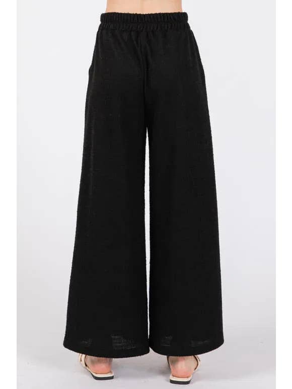 Schwarz Weit geschnittene Tweed-Hose für den Großhandel auf Faire6