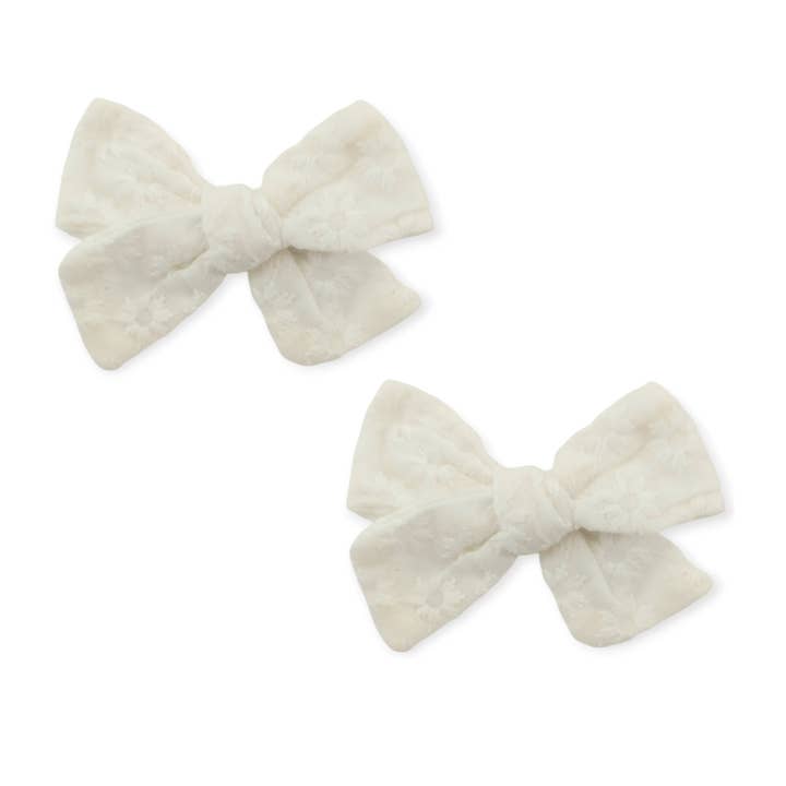 Paket med 2 broderade klämmor för wholesale av Koquitos