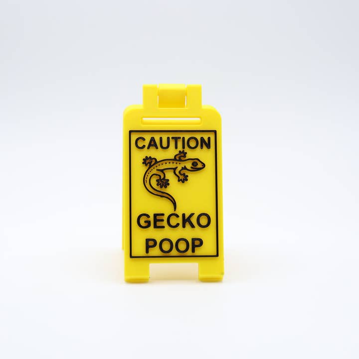 Caution Gecko Poop Floor Sign – Funny Gag Gift for Reptile and other Purchase Wholesale reptile accessories. Free Returns & Net 60 Terms on Faire trending on Faire.
