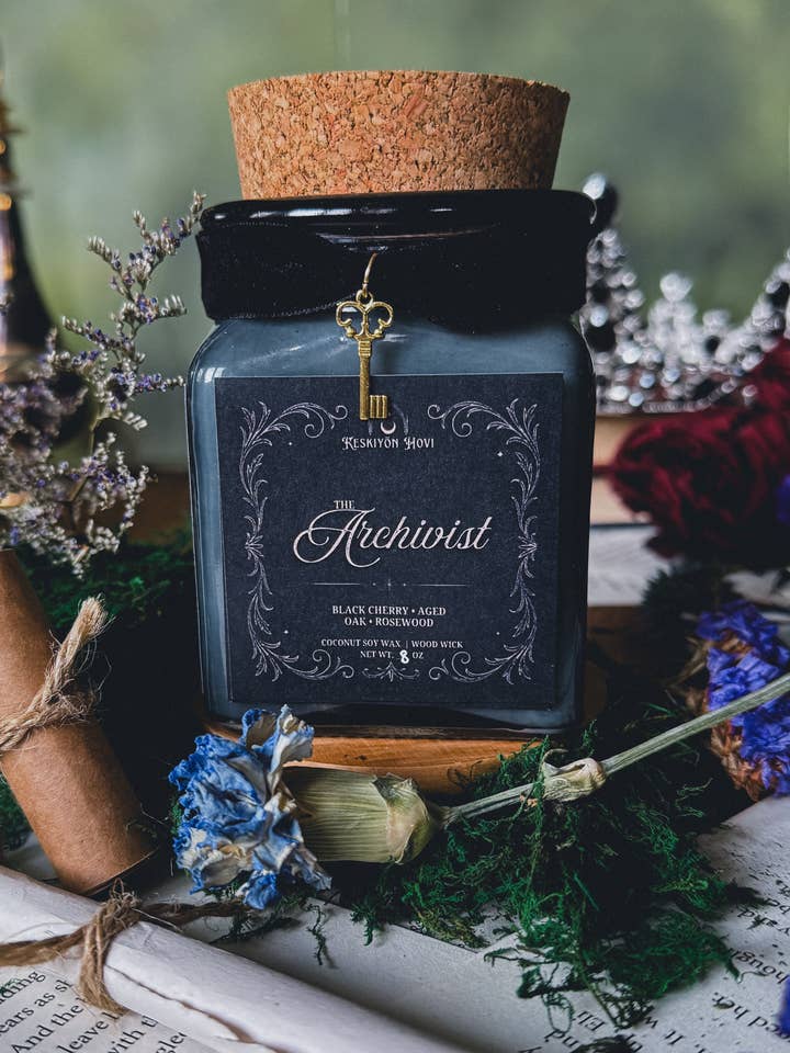 The Archivist Literary Candle and Charm - Aged Oak and Rose for wholesale by Keskiyön Hovi FKA Midnight Muse Candles