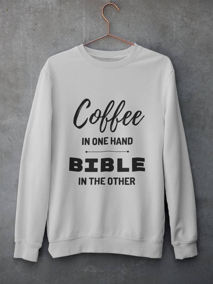 Coffee In One Hand, Bible In The Other Shirt for wholesale by God's Nesting Place