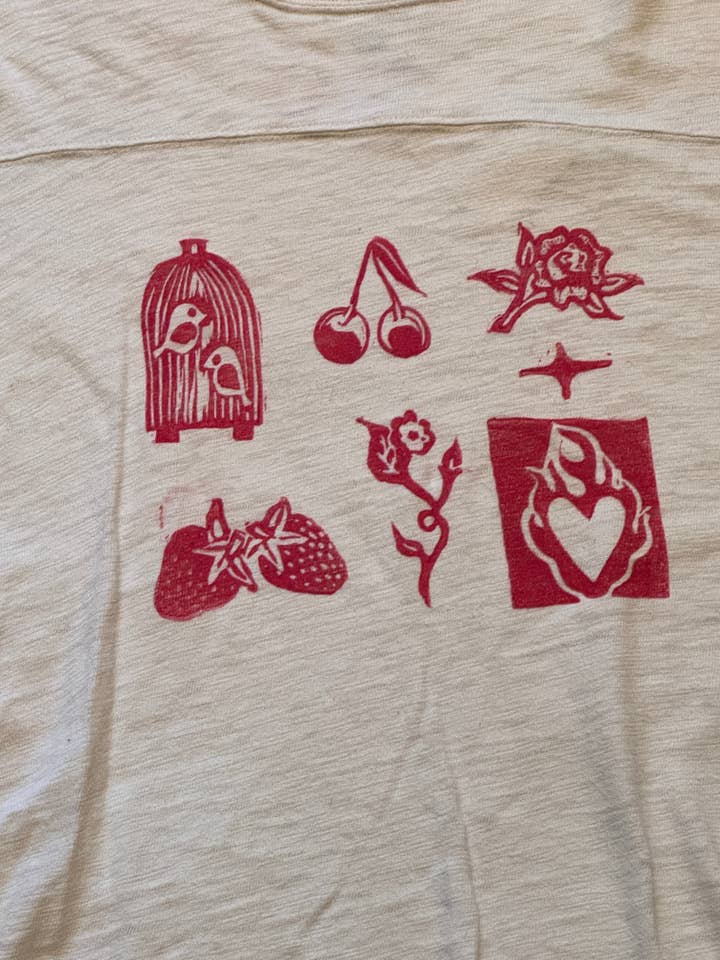 Sustainable Oatmeal Sweater with Red Valentine Prints for wholesale by Queer The Way