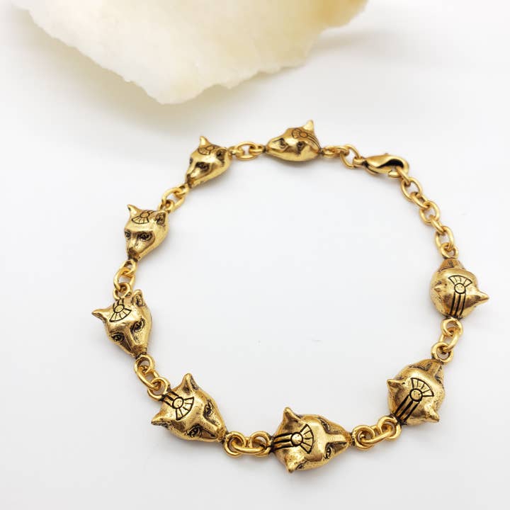 Discoveries, Inc. – Großhandel Glieder- & Kettenarmband – Ägyptisches Katzenkopf-Armband - Gold - Bastet-Göttin3