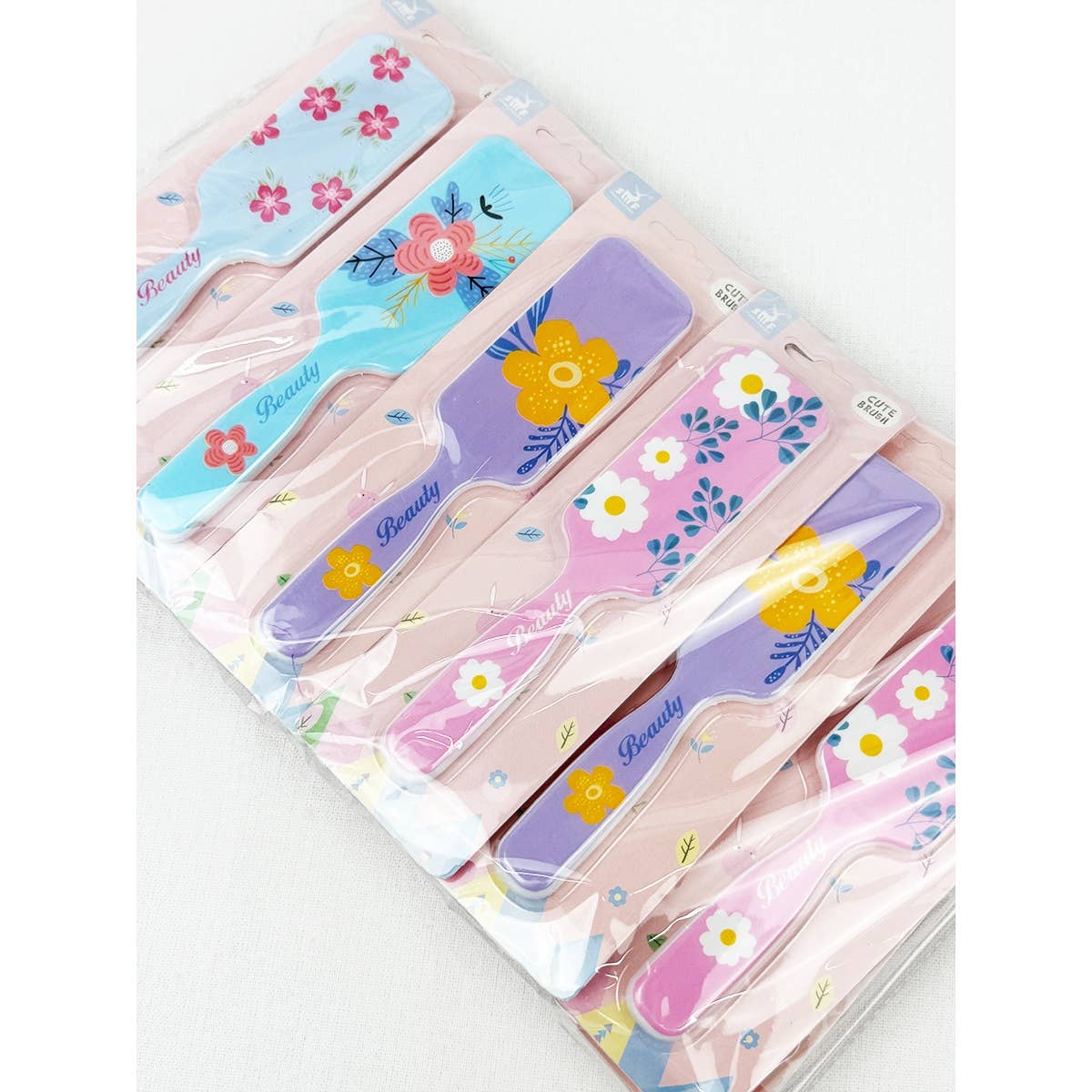 MÉLANGER LA COULEUR Brosse à cheveux rectangulaire à imprimé floral frais en vente sur Faire6