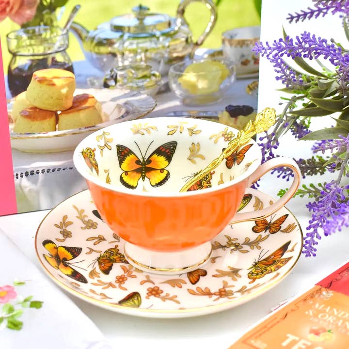 Butterfly Garden on Monarch Orange Teacup and Saucer for wholesale by All Little Cute Things
