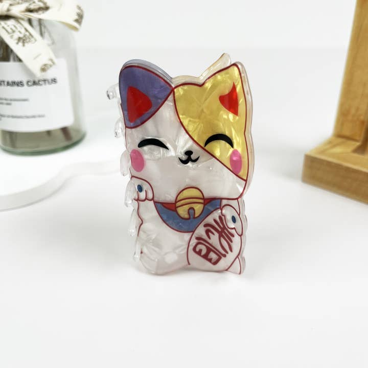 White Japanese Lucky Cat Acrylic Hair Clip for wholesale on Faire
