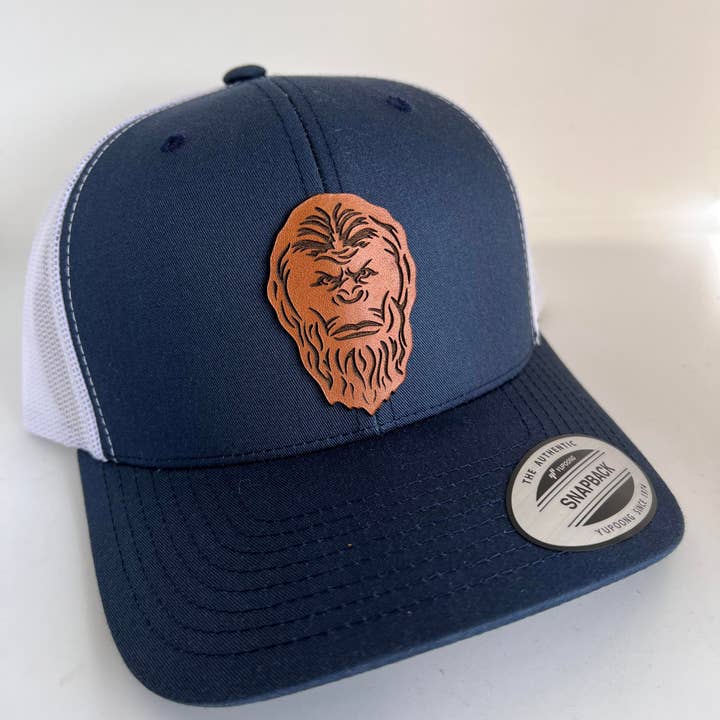Bigfoot Trucker Hat for men. Leather patch hat for men! for wholesale by Lucky Crow Hat Co.