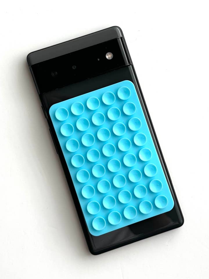 Phone Sticky Grip 2 Sided Silicone Suction Pad Blue and other Purchase Wholesale grip. Free Returns & Net 60 Terms on Faire trending on Faire.