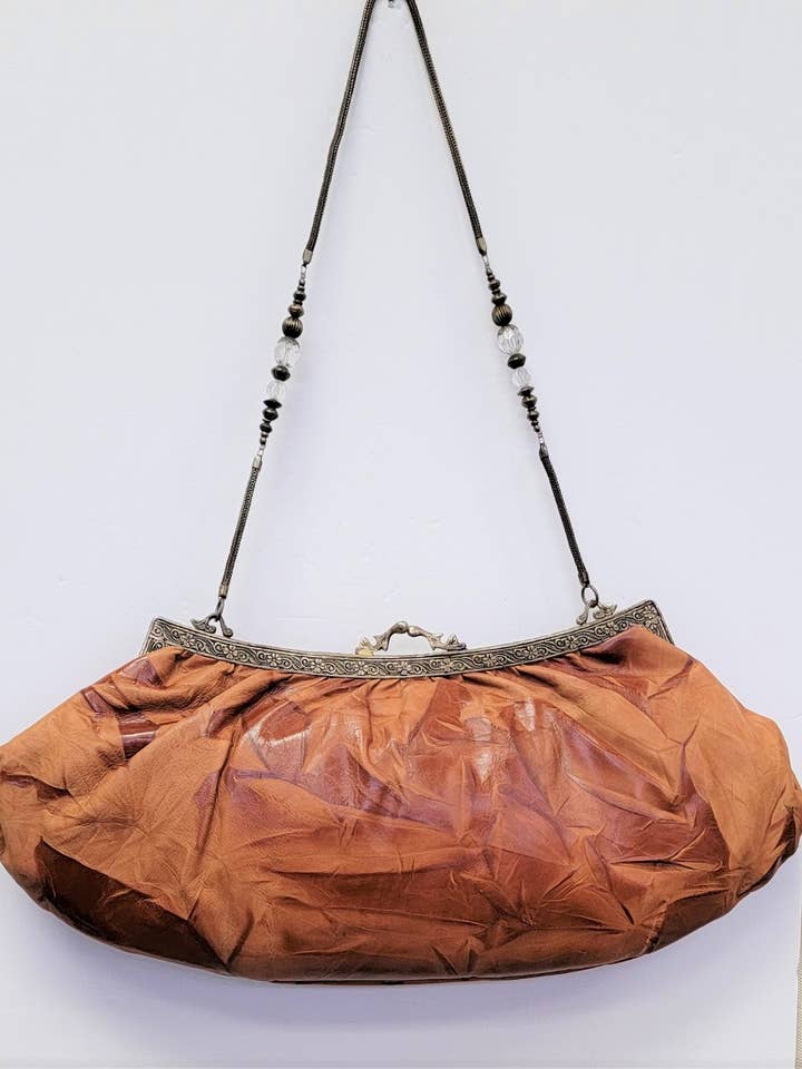 VINTAGE CLASSIC OVERSIZE LEATHER CLUTCH for wholesale by Ricki designs