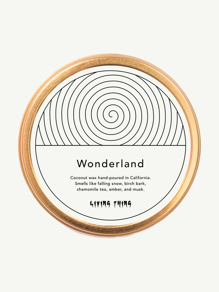 Wonderland Holiday Candle Travel Tin: Snow + Chamomile for wholesale by Living Thing