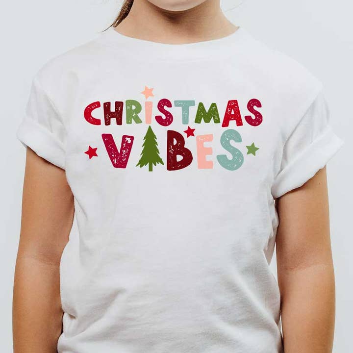 Christmas Vibes Whimsical Kids Graphic Tee for wholesale by Kids By Kissed Apparel
